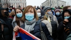 People gather during a protest against the jailing of opposition leader Alexei Navalny in Moscow, Russia, Saturday, Jan. 23, 2021. Russian police are arresting protesters demanding the release of top Russian opposition leader Alexei Navalny at…