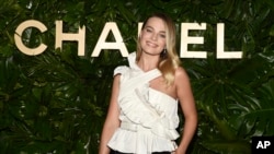 Actress and brand ambassador Margot Robbie attends the launch of the Gabrielle Chanel Essence fragrance at the Chateau Marmont in Los Angeles, Sept. 12, 2019. 