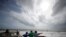 People on a boardwalk look out over the high surf from the Atlantic Ocean, in advance of the potential arrival of Hurricane Dorian, in Vero Beach, Florida, Sept. 2, 2019.