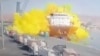 This photo taken from CCTV video broadcast by Al-Mamlaka TV shows the explosion of a chlorine gas container in the port of Aqaba, Jordan, June 27, 2022.