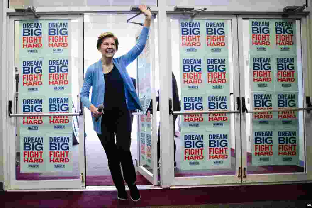 Democratic presidential candidate Sen. Elizabeth Warren, D-Mass., waves to supporters and volunteers, Feb. 29, 2020, in Columbia, S.C. 