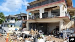 A view of the home where a New Year's Eve fireworks explosion killed and injured people, Jan. 1, 2025, in Honolulu.