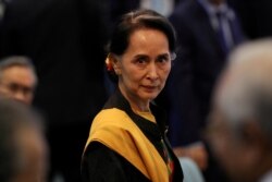 FILE - Myanmar State Counselor Suu Kyi attends the opening session of the 31st ASEAN Summit in Manila, Feb. 1, 2021.