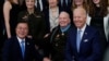 President Joe Biden, retired U.S. Army Col. Ralph Puckett and South Korean President Moon Jae-in, pose for a photo after Puckett was presented the Medal of Honor in the East Room of the White House.