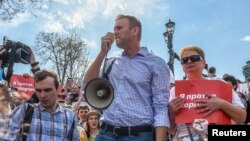 Le leader de l'opposition russe Alexei Navalny manifeste avant la cérémonie d'investiture du président Vladimir Poutine, Moscou, Russie, le 5 mai 2018