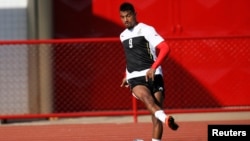 Ghana's Kevin-Prince Boateng controls a ball during a training session ahead of their 2014 World Cup against Portugal, in Brasilia, June 25, 2014.