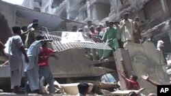 A crowd in Meikhitla, Burma is looting merchandise from a shop, March 22, 2013. The shop owner is pleading for the crowd to not set fire to his store, telling them instead to take whatever they want.&nbsp;