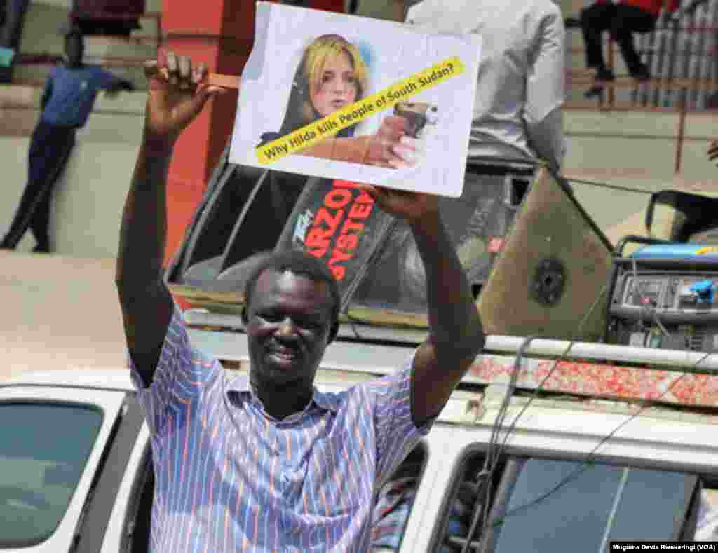 A protester at a rally in Juba on March 10, 2014, holds up a sign against UNMISS head Hilde Johnson.