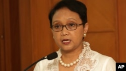 FILE - Indonesian Foreign Minister Retno Marsudi speaks during a press conference in Jakarta, Feb. 17, 2015.