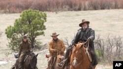 Left to right: Hailee Steinfeld plays Mattie Ross, Matt Damon plays LaBeouf, and Jeff Bridges plays Rooster Cogburn in Paramount Pictures’ “True Grit.”