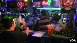 FILE - Inside a Rio de Janeiro bar on an evening during the Summer Olympic Games (J. Swicord/VOA)