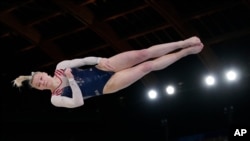 Jade Carey, of United States, performs on the floor exercise during the artistic gymnastics women's apparatus final at the 2020 Summer Olympics, Aug. 2, 2021, in Tokyo, Japan.