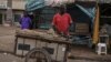 FILE - A vendor sells goods outside a market in Niger on August 14, 2023. 