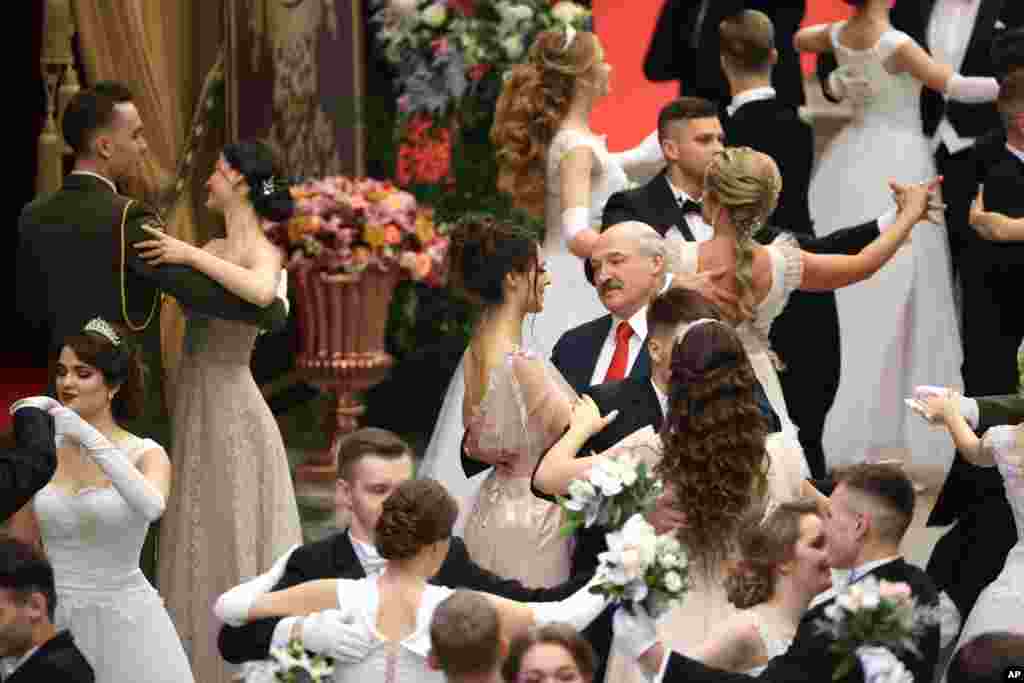 Belarusian President Alexander Lukashenko dances during a New Year&#39;s ball for youth in Minsk, Dec. 29, 2020.