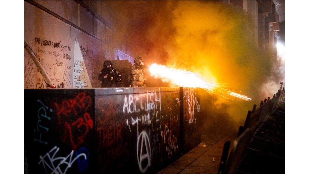 Federal agents use crowd control munitions to disperse Black Lives Matter protesters at the Mark O. Hatfield United States Courthouse, July 19, 2020, in Portland, Oregon.