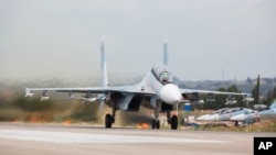 Tư liệu- Một chiếc máy bay chiến đấu Su-30 của Nga tại Syria. 