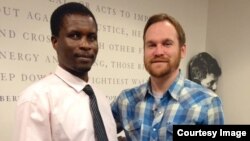 Jeffrey Smith with Swaziland's Sipho Gumedze.