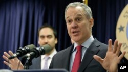 FILE - New York state Attorney General Eric Schneiderman, pictured March 21, 2016, says that "millions of New Yorkers are breathing unhealthy air as smog pollution continues to pour in from other states."