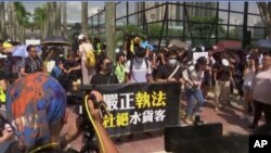 香港上水和沙田區星期六（2019年7月13日）爆發反“水貨客”抗議。(圖片來源：美聯社 )