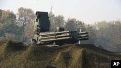 FILE - A photo provided by the Serbian Presidential Press Service shows the Russian air defense system Pantsir S displayed during joint militry exercises at Batajnica military airport, near Belgrade, Serbia, Oct. 25. 2019.