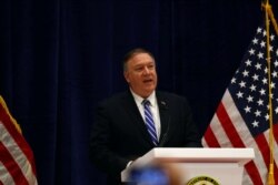 FILE - U.S. Secretary of State Mike Pompeo speaks during a news conference after a signing ceremony between members of Afghanistan's Taliban delegation and U.S. officials in Doha, Qatar, Feb. 29, 2020.