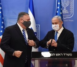 مایک پمپئو، وزیر خارجه آمریکا، در کنفرانس خبری مشترکی با بنیامین نتانیاهو، نخست وزیر اسرائیل، در اورشلیم. ۲۴ اوت ۲۰۲۰
