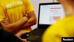 A laptop displays results on a Wahl-O-Mat webpage in Berlin, Germany, Aug. 30, 2017. The online tool helps German voters choose a party for upcoming general elections.