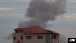 FILE — Smoke billows during Israeli bombardment over Rafah in the southern Gaza Strip on February 13, 2024 amid the ongoing conflict between the Middle Eastern nation and Hamas militants.