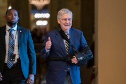 FILE - Senate Majority Leader Mitch McConnell, R-Ky., suffered a broken shoulder at his home during the August recess. Congress returned, Sept. 9, 2019, with pressure mounting on McConnell to address gun violence, election security and other issues.