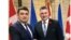 Джеймс Безан з Володимиром Гройсманом