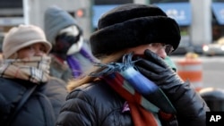 People bundle up against the cold in New York City, Jan. 7, 2014.