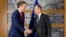 European Council President Donald Tusk, right, shakes hands with the chair of the Eurogroup Jeroen Dijsselbloem ahead of a meeting of eurozone finance ministers at the Europa building in Brussels on Dec. 4, 2017.
