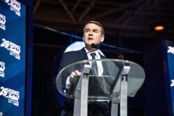 FILE - Democratic presidential candidate, Sen. Michael Bennet, D-Colo., speaks at the 2019 Essence Festival at the Ernest N. Morial Convention Center, July 6, 2019, in New Orleans.