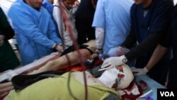 2 Repòtè Fotograf Mouri nan Libi