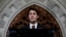 FILE - Canada's Prime Minister Justin Trudeau, shown participating in a news conference in Ottawa last month, stressed the importance of U.S.-Canada ties in a video address to the new Congress in Washington. 