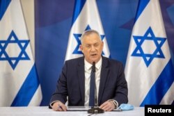 FILE - Israel's Defense Minister Benny Gantz issues a statement in Tel Aviv, Israel, July 27 2020.