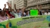 FILE - Members from Pakistan's minority community and civil society chant slogans during a demonstration against the conviction of a Christian man on charges of blasphemy and condemn the country's blasphemy laws, July 2, 2024. 