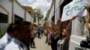 Dozens of Cypriots Call for Reunification With Linked Arms