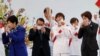 Waves, Smiles but No Cheers as Olympic Torch Relay Kicks Off Under Pandemic Shadow 