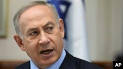 Israeli Prime Minister Benjamin Netanyahu chairs a weekly cabinet meeting, in Jerusalem, Jan. 1, 2017.