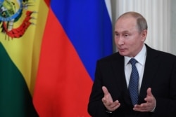 Russian President Vladimir Putin speaks as he meets with his Bolivian counterpart at the Kremlin in Moscow, July 11, 2019.