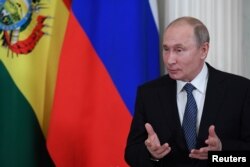 Russian President Vladimir Putin speaks as he meets with his Bolivian counterpart at the Kremlin in Moscow, July 11, 2019.
