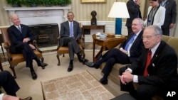 President Barack Obama meets with, from left, Vice President Joe Biden, Senate Majority Leader Mitch McConnell, and Senate Judiciary Committee Chairman Sen. Chuck Grassley, in the Oval Office of the White House, March 1, 2016, to discuss the vacancy in the Supreme Court. 