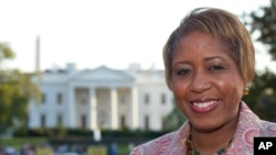 FILE - Angella Reid is photographed in Lafayette Park in front of the White House, Oct. 18, 2011, in Washington. 