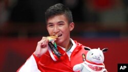 Rifki Ardiansya mempersembahkan emas ke-11 bagi kontingen Indonesia dari cabang karate pada Asian Games 2018.