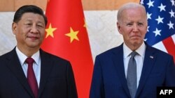 FILE — US President Joe Biden and China's President Xi Jinping meet on the sidelines of the G20 Summit in Bali, Indonesia on November 14, 2022. On November 1r, 2023,the two will meet on the sidelines of the Asia-Pacific Economic Cooperation in San Francisco.