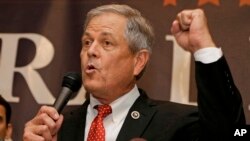 FILE - Republican Ralph Norman speaks to supporters at a campaign party in Rock Hill, S.C., June 20, 2017, after winning South Carolina's 5th Congressional District. Norman pulled out his own loaded handgun during a meeting with constituents Friday to make a point that guns are dangerous only in the hands of criminals.