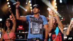 Luke Bryan performs at the 2013 CMA Music Festival at LP Field on June 6, 2013 in Nashville Tennessee.