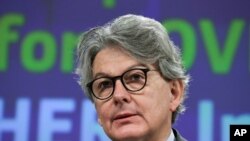 European Commissioner for Internal Market Thierry Breton addresses a media conference at EU headquarters in Brussels, Feb. 17, 2021, and said that it has agreed to buy a further 300 million doses of Moderna's vaccine against COVID-19.