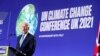 Biden Touts Climate Commitments, Slams Adversaries at Climate Summit 